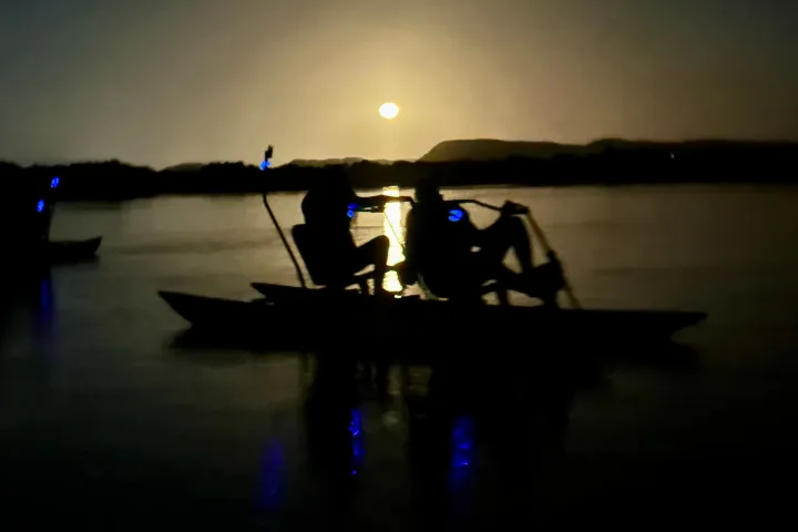 a laptop computer sitting on top of a table