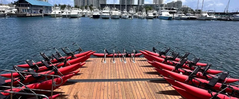 a row of boats in a large body of water