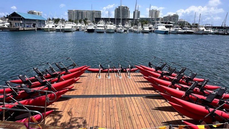 a row of boats in a large body of water